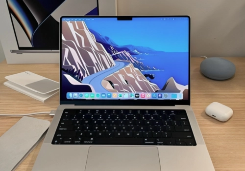 MacBook Pro M4 open on a workspace, featuring vibrant display and premium build for elite UAE users.